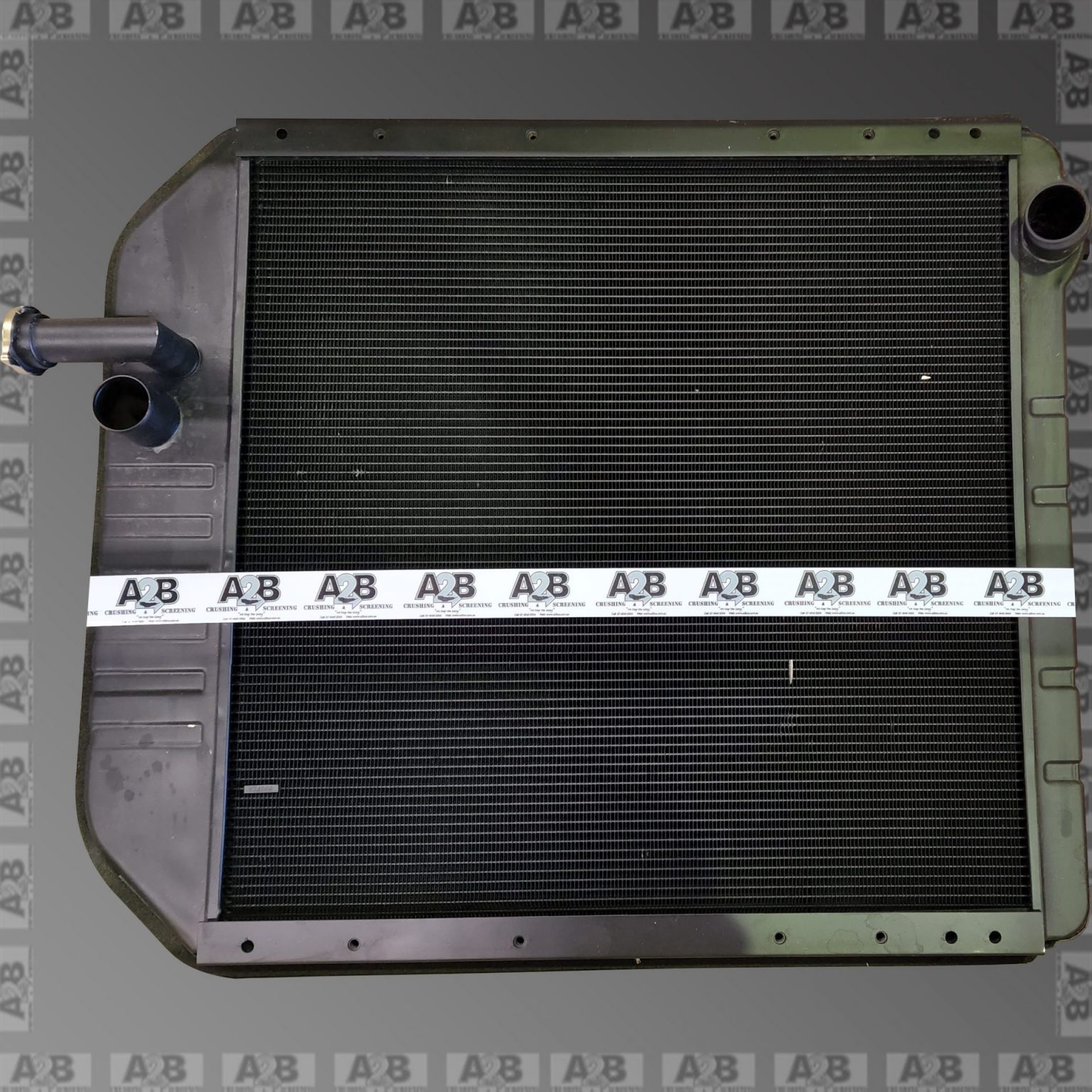 CAT GRADER RADIATOR GROUP - A2B Crushing and Screening